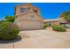 Charming house featuring desert landscaping and a two-car garage at 25210 N 40Th Ave, Phoenix, AZ 85083