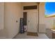 Charming front porch features a decorative security door, 'welcome' sign, and desert-friendly landscaping at 25210 N 40Th Ave, Phoenix, AZ 85083
