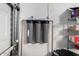 Garage featuring a water filtration system installed on the wall at 25210 N 40Th Ave, Phoenix, AZ 85083