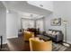 Bright living room featuring hardwood floors and contemporary furnishings at 25210 N 40Th Ave, Phoenix, AZ 85083