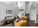 Stylish living room with high ceilings, neutral color scheme, and wood floors at 25210 N 40Th Ave, Phoenix, AZ 85083