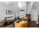 Stylish living room with high ceilings, neutral color scheme, and wood floors at 25210 N 40Th Ave, Phoenix, AZ 85083