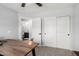 Functional home office with large desk, adjacent to the bathroom and ample closet space at 25210 N 40Th Ave, Phoenix, AZ 85083