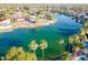 Scenic aerial view with tall palms reflecting in the water, surrounded by waterfront properties at 2552 S Playa --, Mesa, AZ 85202