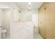 Bright bathroom featuring a glass shower with modern tile and gold fixtures at 2552 S Playa --, Mesa, AZ 85202