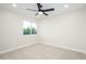 This bedroom is carpeted and well lit from a window with a view at 2552 S Playa --, Mesa, AZ 85202