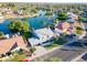 The property includes well-maintained lawns, mature trees, and a welcoming facade at 2552 S Playa --, Mesa, AZ 85202