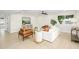 Bright living room featuring neutral tones, modern furniture, and a ceiling fan at 2552 S Playa --, Mesa, AZ 85202