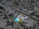 Aerial view of a home with a private pool and well-maintained backyard in a residential neighborhood at 2608 W Aster Dr, Phoenix, AZ 85029