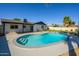 Backyard view of house with pool at 2608 W Aster Dr, Phoenix, AZ 85029