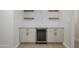 Custom bar with shelving and built-in wine cooler at 2608 W Aster Dr, Phoenix, AZ 85029