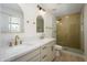 Elegant bathroom featuring a double vanity, modern fixtures, and a tiled shower at 2608 W Aster Dr, Phoenix, AZ 85029