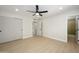 This sleek bedroom features a doorway to the en suite bathroom at 2608 W Aster Dr, Phoenix, AZ 85029