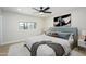 A cozy bedroom with a comfortable bed, stylish decor, and ample natural light at 2608 W Aster Dr, Phoenix, AZ 85029