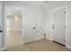 Clean, bright mud room features neutral walls, wood floors, a utility sink, and access to a larger room at 2608 W Aster Dr, Phoenix, AZ 85029