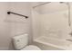 Bright bathroom featuring a clean white tile shower-tub combo and modern fixtures at 2727 N Price Rd # 32, Chandler, AZ 85224