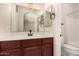 Bathroom featuring dark wood vanity with sink and a shower/tub combo at 2727 N Price Rd # 32, Chandler, AZ 85224