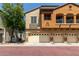 Charming townhome with a two-car garage and a well-maintained exterior with beautiful architectural details at 2727 N Price Rd # 32, Chandler, AZ 85224