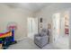bedroom showcasing a comfortable chair and play area, perfect for relaxation and fun at 281 E Shamrock Dr, Chandler, AZ 85286