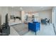 Open-concept living room and kitchen area, with neutral tones and modern furnishings at 281 E Shamrock Dr, Chandler, AZ 85286