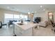 Open concept living area connecting the kitchen, dining, and living room at 281 E Shamrock Dr, Chandler, AZ 85286