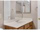 Bathroom featuring a vanity, mirror, and a towel ring next to a white door at 2986 N Oregon St # 7, Chandler, AZ 85225