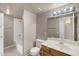 Bathroom featuring a vanity, mirror, toilet, and shower-tub combination at 2986 N Oregon St # 7, Chandler, AZ 85225