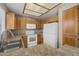 Functional kitchen features white appliances and a sink overlooking the window at 2986 N Oregon St # 7, Chandler, AZ 85225
