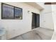 Outdoor patio featuring a sliding door, a window, and a white door at 2986 N Oregon St # 7, Chandler, AZ 85225