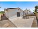 Backyard with a patio and outdoor dining set at 3021 E Harmony Cir, Mesa, AZ 85204