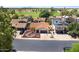 Single Gathering home with a manicured front yard, two-car garage, and proximity to a green space at 3021 E Harmony Cir, Mesa, AZ 85204