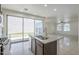 Bright open concept kitchen with granite island, stainless appliances and access to living room at 3451 S Wren Dr, Gilbert, AZ 85297