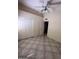 Bedroom showcasing a closet and tile flooring at 3510 E Hampton Ave # 133, Mesa, AZ 85204