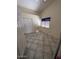 Well-lit bedroom with tile floors, a window and closet at 3510 E Hampton Ave # 133, Mesa, AZ 85204