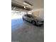 Garage view featuring a car parked inside at 3510 E Hampton Ave # 133, Mesa, AZ 85204