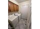 Laundry room with washer, dryer, and cabinets at 3510 E Hampton Ave # 133, Mesa, AZ 85204
