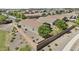 Aerial view of a fenced backyard with gravel landscaping, small shrubs, and patio furniture at 37103 N El Morro Trl, San Tan Valley, AZ 85140