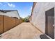 Wide backyard featuring gravel and block wall, offering a low-maintenance outdoor space at 3915 N Shannon Cir, Mesa, AZ 85215