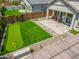 Aerial shot of a backyard offering a putting green, patio, and privacy landscaping for a peaceful outdoor retreat at 3915 N Shannon Cir, Mesa, AZ 85215