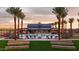 Beautiful community pool with lounge chairs and palm trees, offering a resort-style atmosphere for residents at 3915 N Shannon Cir, Mesa, AZ 85215