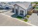 Aerial view of a charming single-Gathering home showcasing landscaping and a two-car garage at 3915 N Shannon Cir, Mesa, AZ 85215