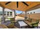 Comfortable patio with ceiling fan and nice furniture perfect for outdoor entertaining and relaxation at 3915 N Shannon Cir, Mesa, AZ 85215