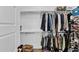 Walk-in closet with rods, shelves, and abundant storage for clothes and shoes at 3915 N Shannon Cir, Mesa, AZ 85215