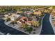An aerial view showcasing a home with solar panels, desert landscaping, and a convenient location within the community at 4029 N 160Th Dr, Goodyear, AZ 85395
