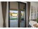Patio sliding glass doors offers a view of the pool and backyard at 4029 N 160Th Dr, Goodyear, AZ 85395
