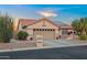 Inviting single-story home with desert landscaping and covered entrance at 4029 N 160Th Dr, Goodyear, AZ 85395