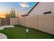 Spacious backyard with an artificial putting green at 4029 N 160Th Dr, Goodyear, AZ 85395