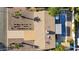 A bird's eye view shows the home with a swimming pool, covered patio, desert landscaping, and carport at 421 N Evergreen St, Chandler, AZ 85225