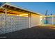 Close-up of the home's architectural details, showcasing the decorative concrete blocks and a glimpse of the colorful entry at 421 N Evergreen St, Chandler, AZ 85225
