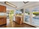 Bright kitchen featuring sleek countertops, stainless steel appliances, and outdoor access at 421 N Evergreen St, Chandler, AZ 85225